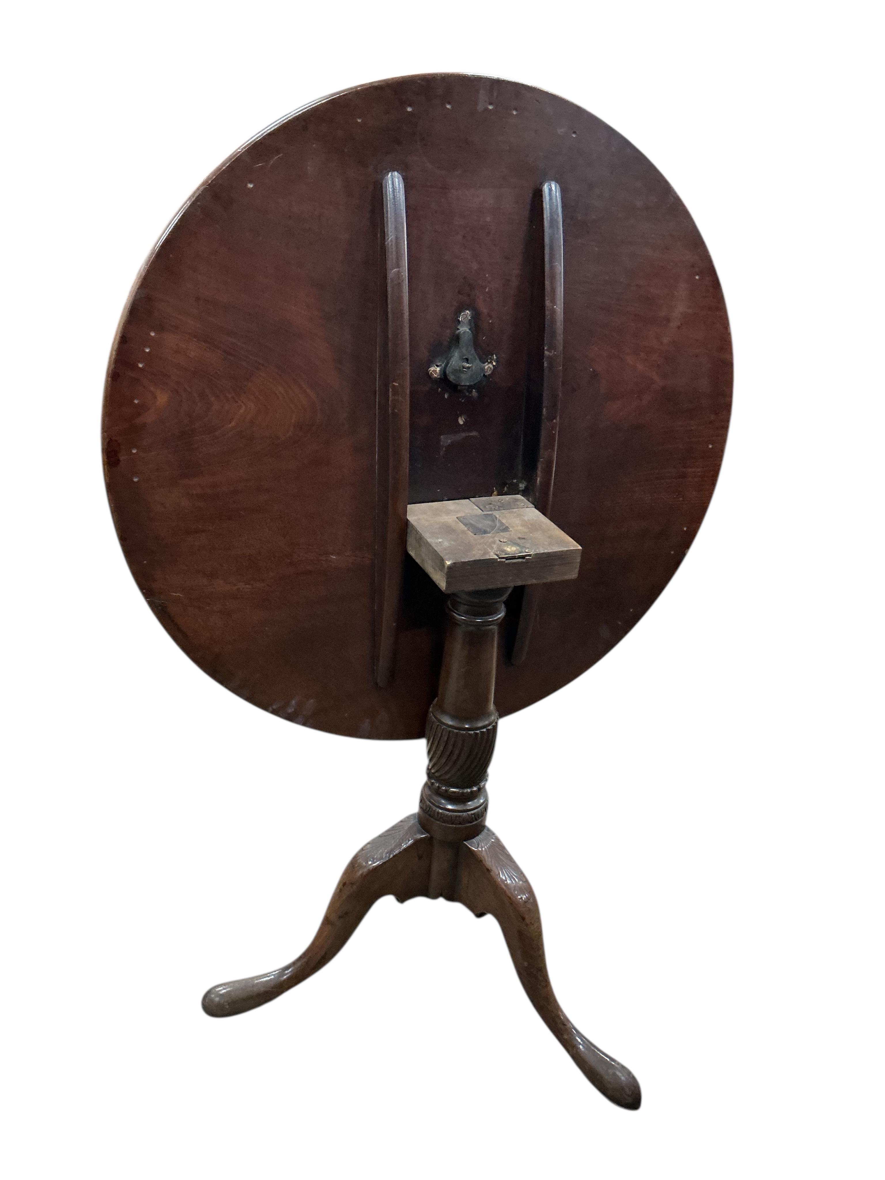 A George III and later circular mahogany tilt top tripod tea table, diameter 80cm, height 70cm
